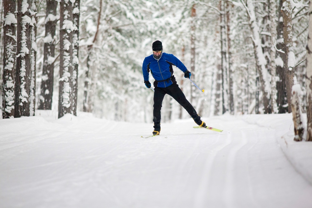 man cross country skiing - one of the best things to do in Minnesota in the winter