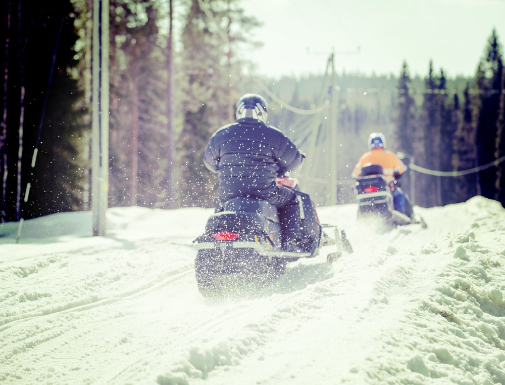 Friends out enjoying the best Wisconsin snowmobiling this winter