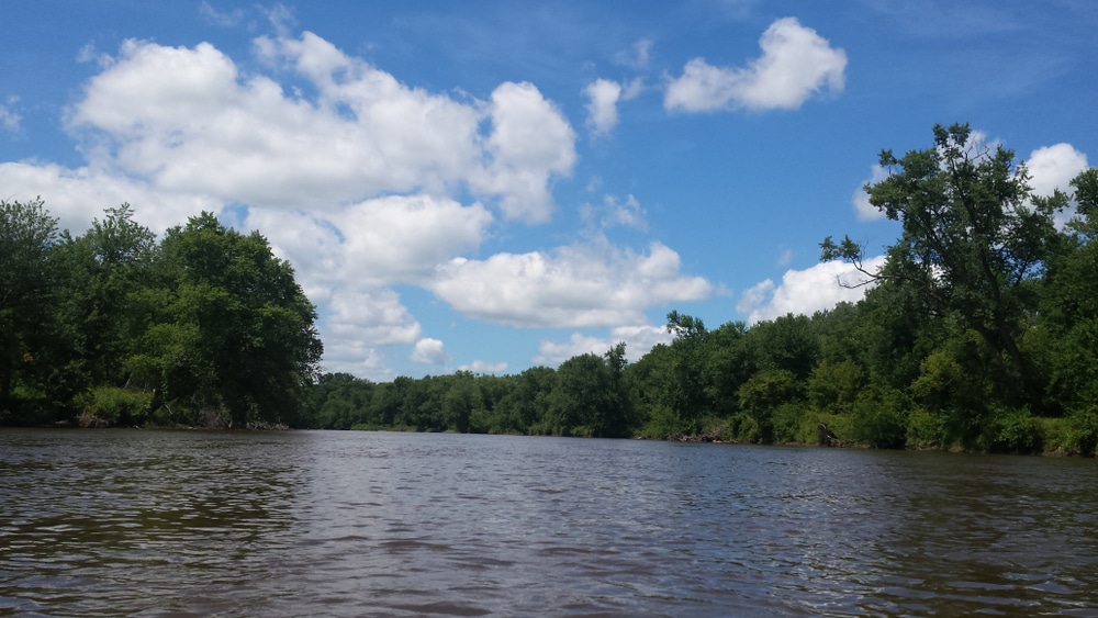 The beautiful waters of the Wapsipinicon River Trail in Iowa - one of the best places to go paddling this summer