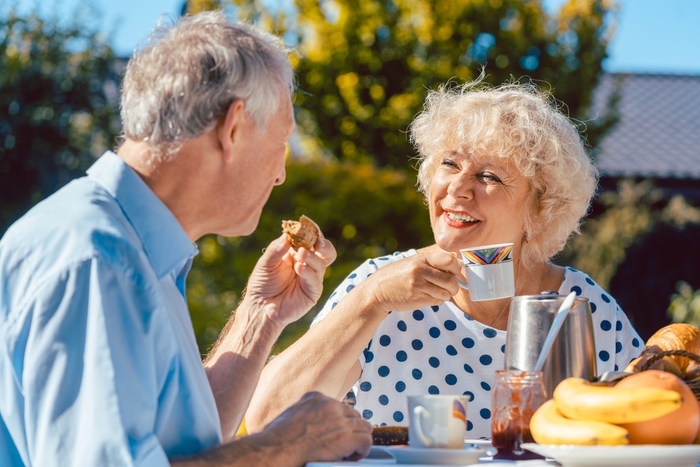 Couple enjoying breakfast at one of the best places to stay in the Midwest