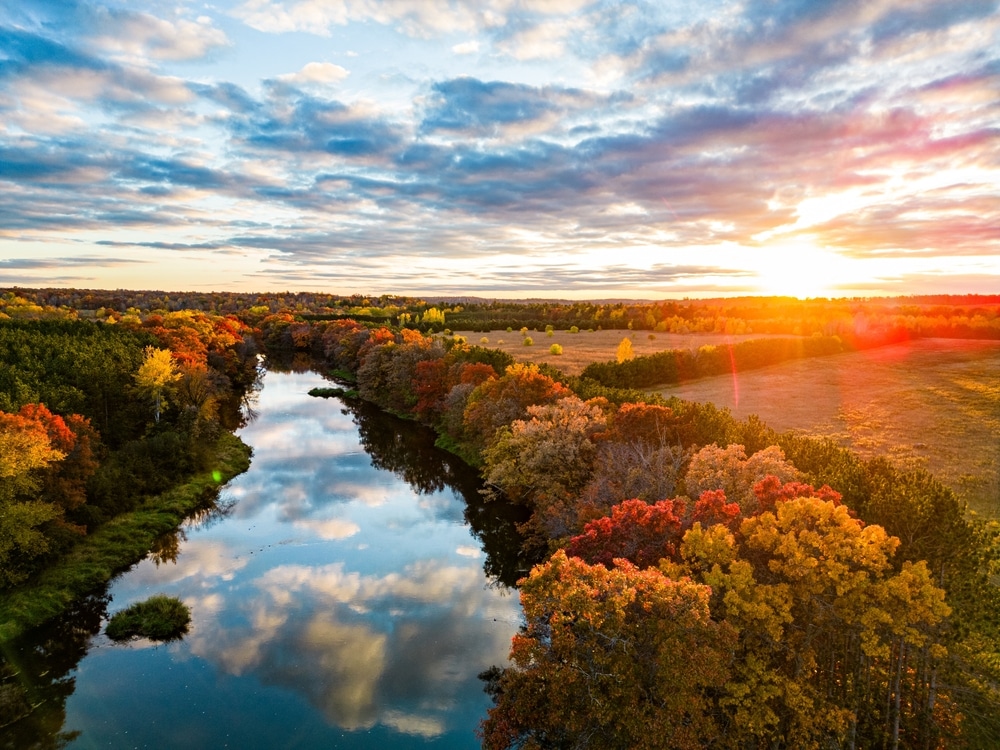 The scenic Wisconsin river in the fall - where you'll find some of the best small towns in Wisconsin