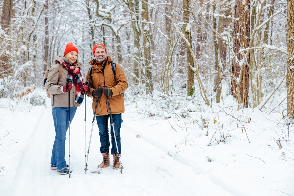 Couple enjoying winter hiking at top places to stay in the Midwest