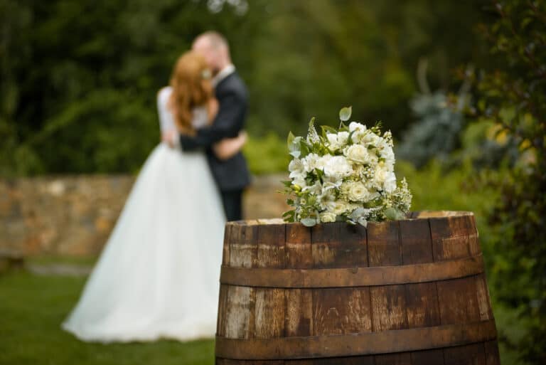 Couple at an outdoor farm wedding venue, some of the most unique wedding venues in the Midwest