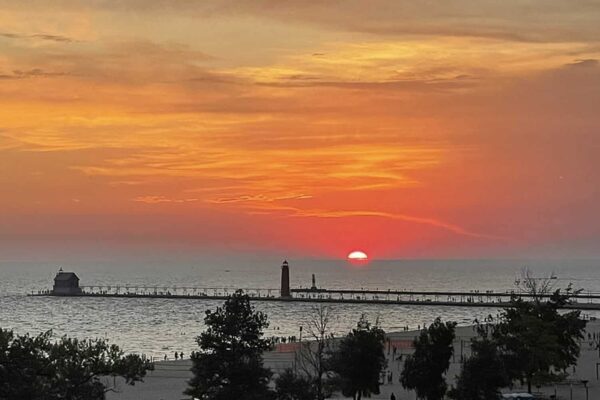 LookingGlass-Beachfront-Inn-Grand-Haven-sunset-1-a-e1724953949103