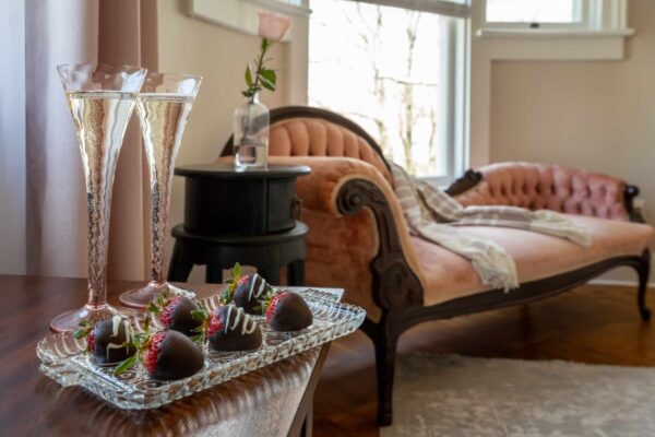Port Austin Bed and Breakfast room with beaurtiful antique furniture and Chocolate covered strawberries