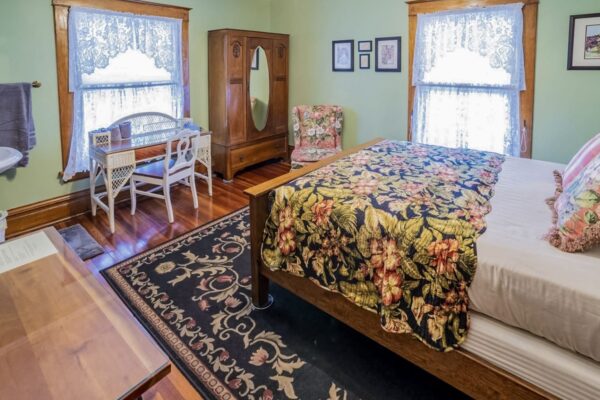Washington-Street-Inn-Grand-Haven-Bettina-room-writing-desk-english-armoire-scaled-a-e1724951873183