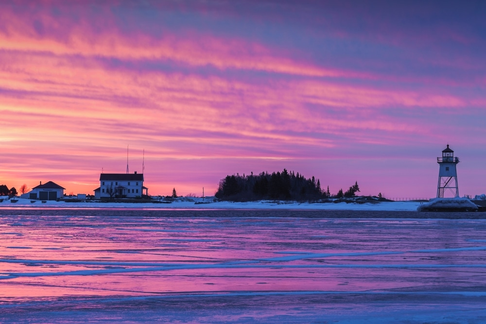 View of the lake in Grand Marais in Winter, one of the best romantic towns in Minnesota for winter getaways