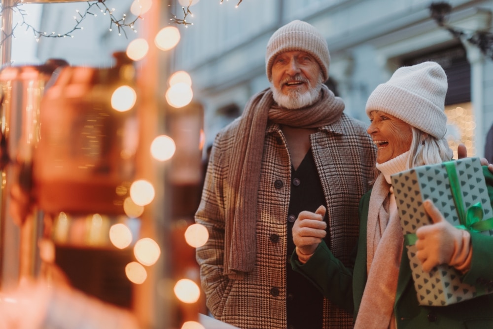A senior couple enjoying some of the best places to visit at Christmas in the Midwest