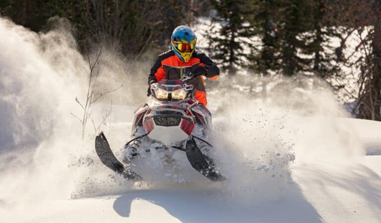 Person out riding in the snow on Michigan Snowmobile Trails