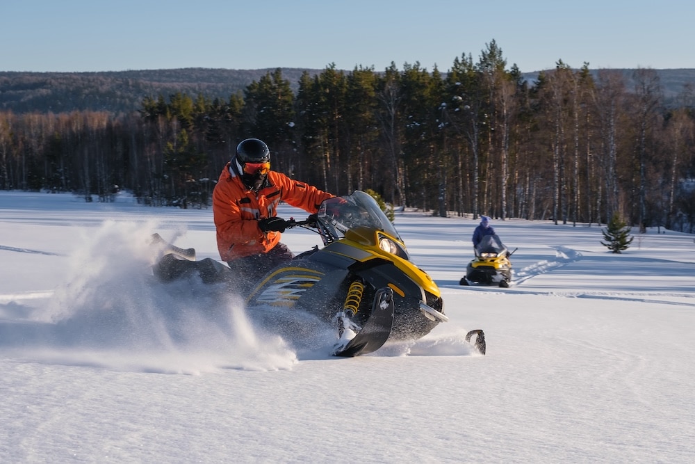 Group of people enjoying the best Wisconsin Snowmobiling trails