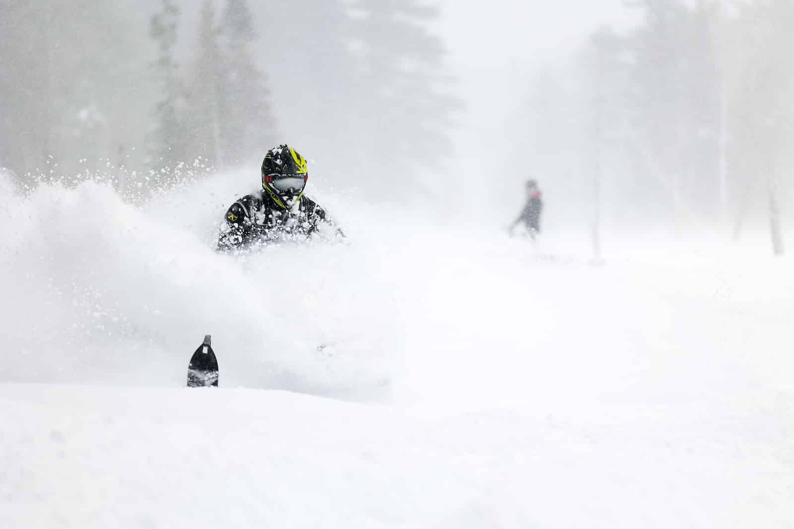 Man enjoying the best Michigan snowmobile trails this winter