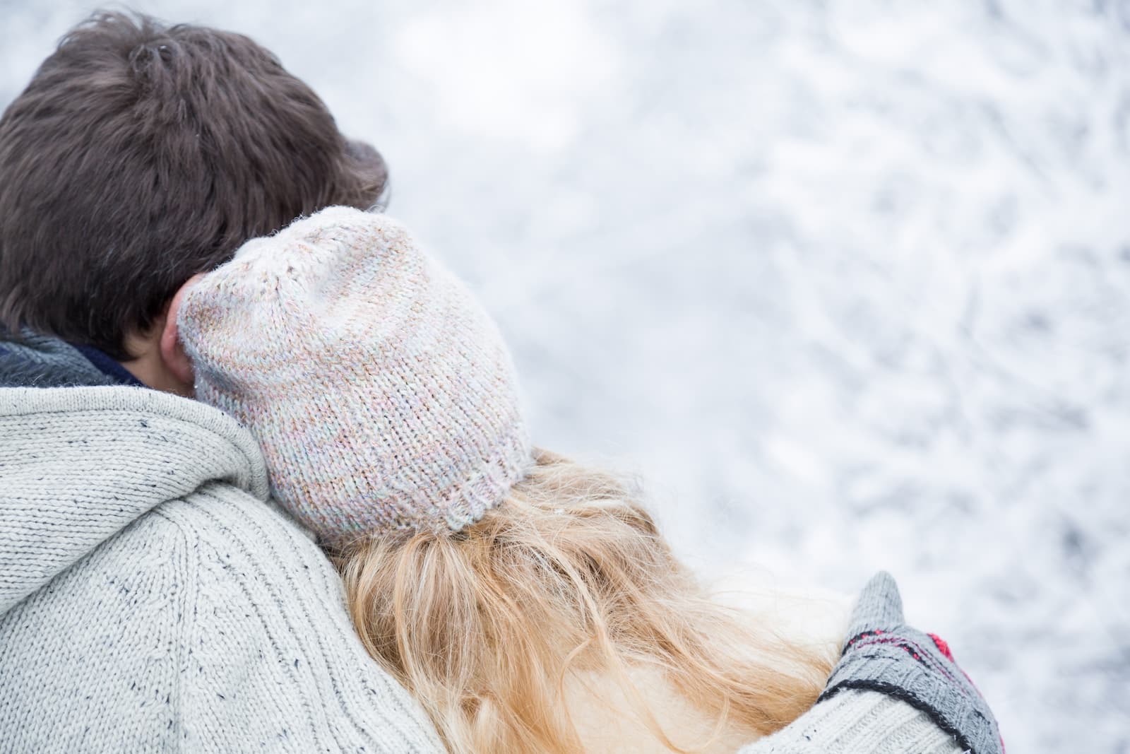 Couple enjoying other winter activities in Michigan during their winter getaways